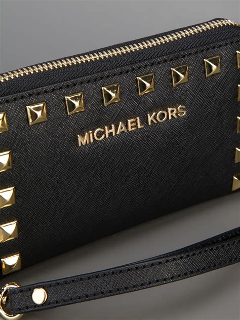 michael kors wristlet black and white|Michael Kors slim wallet black.